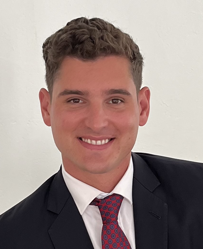 Matt_Daley seen with a bright smile on his face and posing for a photo